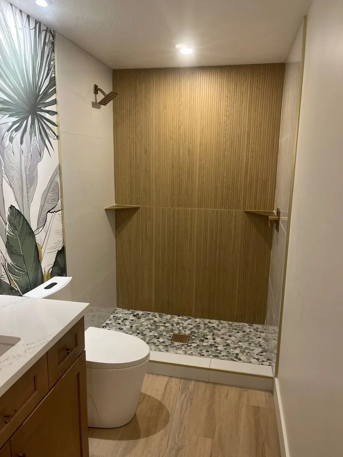 Finished basement bathroom with tiled walk-in shower