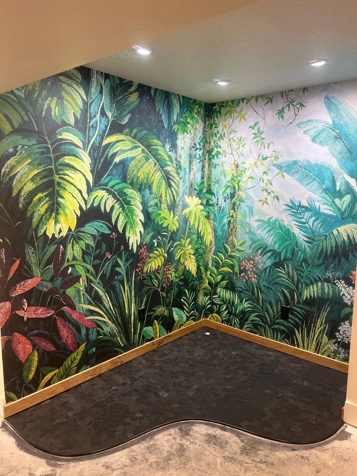 Basement nook with tropical jungle mural wallpaper